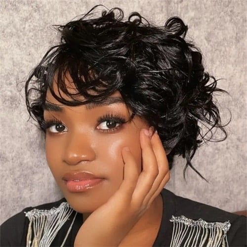 The bushy pixie cut is full of texture and manageable volume.