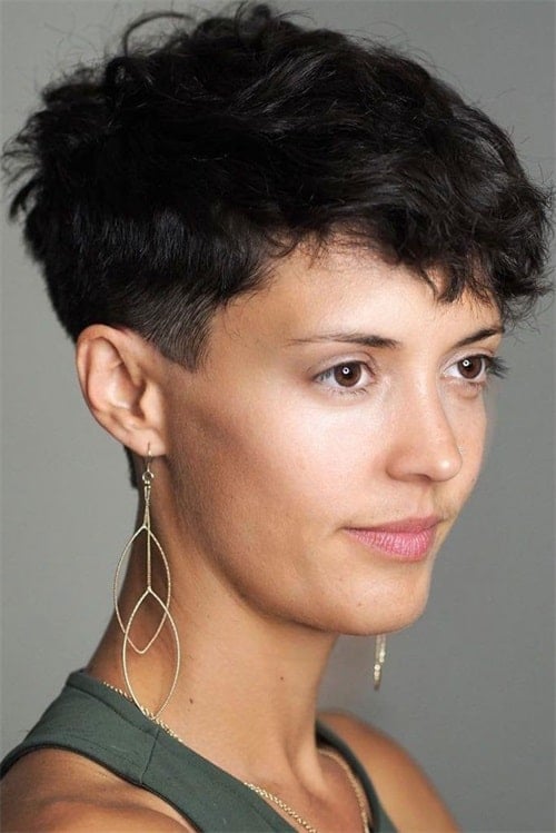 Textured top with buzzed sides and androgynous hairstyle